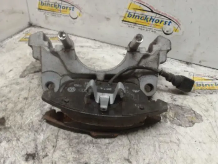 Front brake calliperholder, left Volkswagen Passat