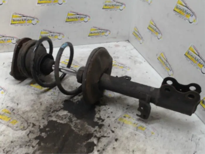 Front shock absorber rod, left Toyota Corolla Verso