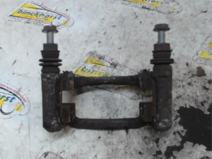 Rear brake calliperholder, left Mini ONE