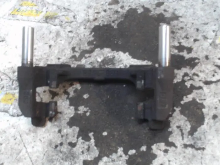 Rear brake calliperholder, right Ford Transit Connect