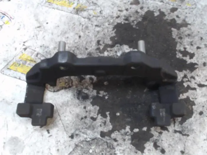 Front brake calliperholder, left Ford Transit Connect