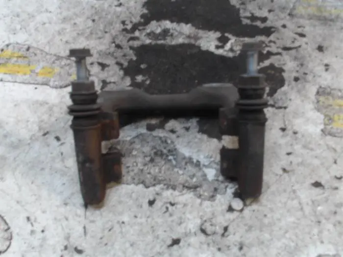Rear brake calliperholder, left Volkswagen Eos