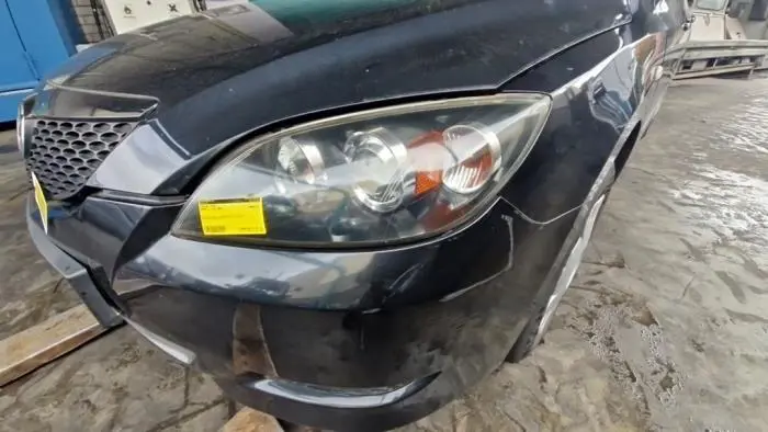 Headlight, left Mazda 3.