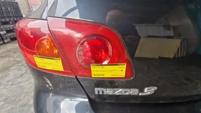 Taillight, left Mazda 3.