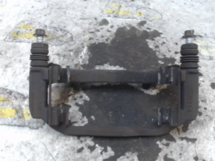 Front brake calliperholder, left Opel Zafira
