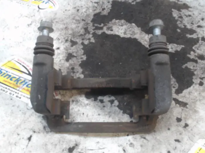 Rear brake calliperholder, left Hyundai I10