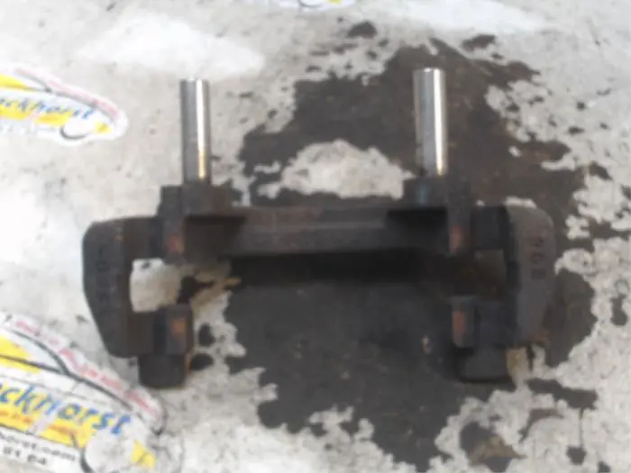 Front brake calliperholder, left Dacia Sandero