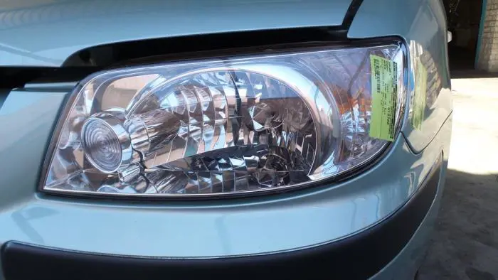 Headlight, left Hyundai Matrix